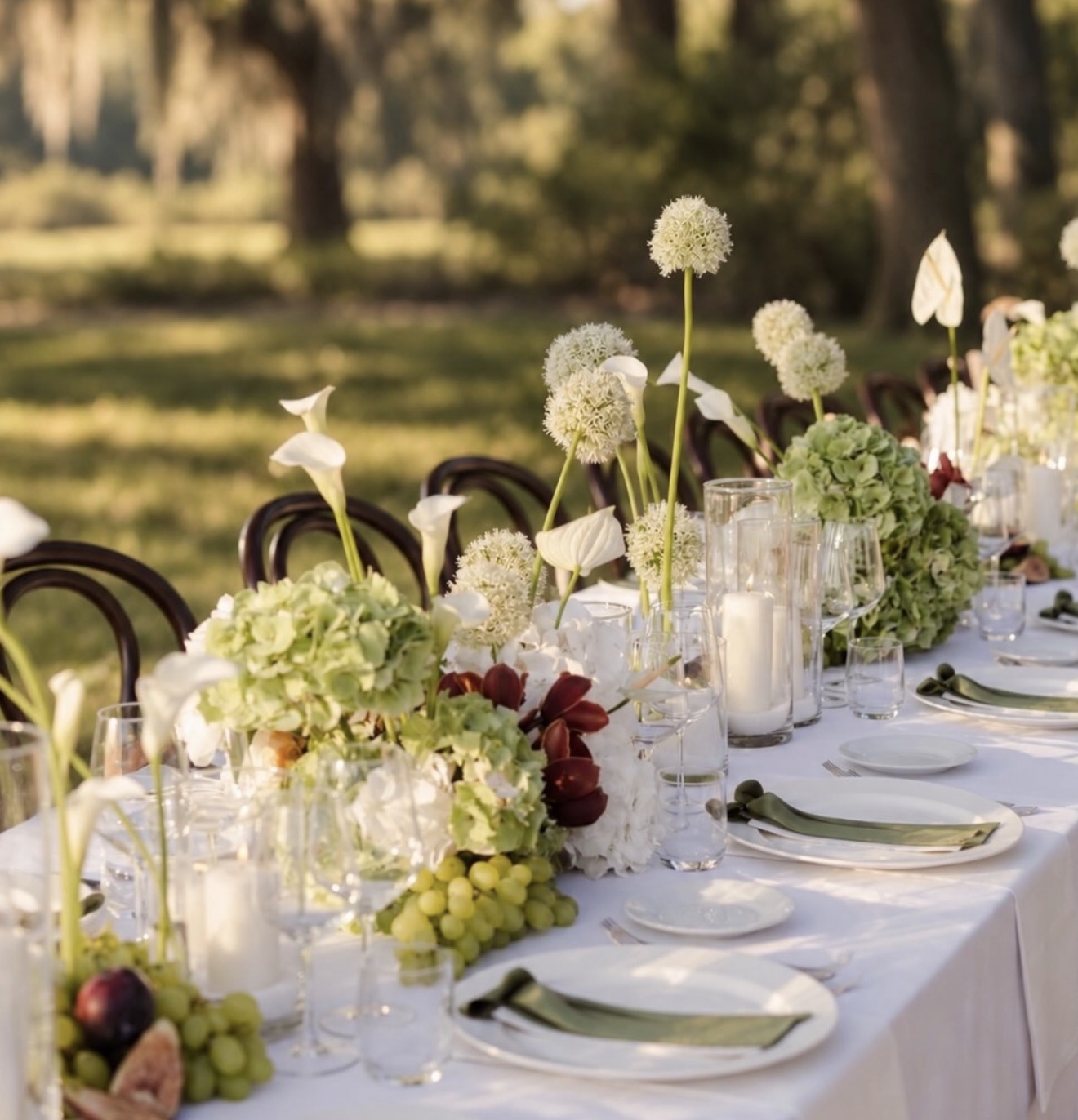 Calla lilies, alliums, hydrangeas and candles from the same engagement party